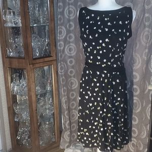 Sleeveless black polka dot dress by glamor size 12
